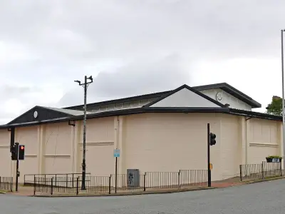 Woman charged over graffiti at New Brighton hardware shop
