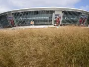 Abandoned Champions League stadium in Ukraine now overgrown with explosives warnings