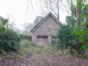 Abandoned Garage Next to Listed Chimney Gets Planning Permission for Home