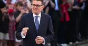Andy Burnham under fire over six Manchester City meetings