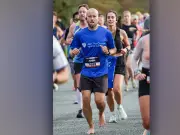 Barefoot Manchester Half Marathon runner raises funds for cancer charity