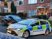Bolton police incident live as officers surround terraced house