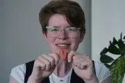 Cancer survivor receives artificial tongue in NHS first
