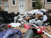 Cannabis plants dumped in garden after police raid in Wishaw