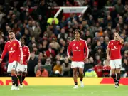 Carrick's United fire fizzles in Spurs draw