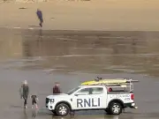 Dad punches beachgoer after taking kids into stormy sea in Cornwall