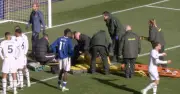Emi Martinez stretchered off after horror clash as Chelsea match suspended