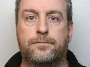 Ex-councillor 'filmed wife being abused after online advert'