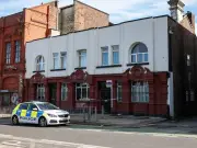 Five arrested after man found dead at Salford HMO