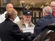 Grandfather's tears at funeral of baby stabbed 15 times