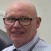 Headteacher 'mowed down and dragged for a mile to his death'