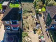 Homeowner denies blame after demolition leaves neighbour in limbo