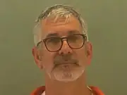 Husband Accused of Taping Wife to Chair to Watch Football