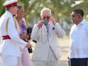 King Charles tries witchcraft maracas on Guyana visit