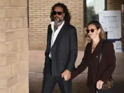 Laura Gallacher: Russell Brand's Wife Stands by Him in Court