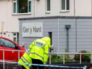 Man, 61, arrested on murder suspicion after Bridgend woman's death