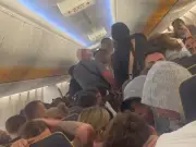 Mid-air brawl erupts on Ryanair flight to Ibiza as police race to meet plane