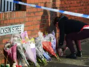 Mother died clutching photo of children killed in petrol bomb attack, inquest hears
