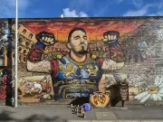 MP condemns 'utterly disgusting' swastika on Tom Aspinall mural