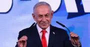 Netanyahu claims victory in Israeli election despite exit poll uncertainty