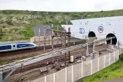 Nineteen injured after minibus crashes into Eurotunnel train