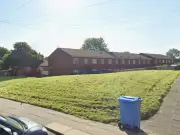 Oldham woman charged after 49 dogs seized from home