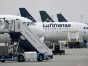 Passenger arrested after trying to open plane door mid-air on Lufthansa flight