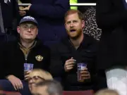 Prince Harry booed at Leicester Tigers match despite relaxed beer in hand