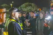 Protesters clash with police as migrants arrive in Gosport on RNLI boats