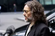 Russell Brand 'did Basil Fawlty silly walks' before rape, court told