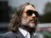 Russell Brand's ex-PA 'stopped mum and girlfriend walking in on him having sex'