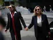 Russell Brand's wife defends him as 'amazing husband' in rape trial