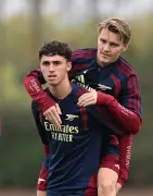Saka Injury Opens Door for Scanlon Debut at Arsenal