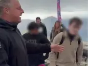 Snowdon flag protest: 'Stop the boats' walker clashes with trainee doctors