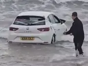 Submerged car pulled from Fife sea as man arrested