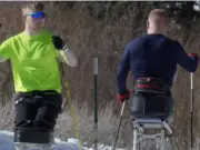 Teen who lost both legs in crash finds freedom again in skiing