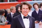 Tom Cruise surprises British fundraiser with extreme challenges
