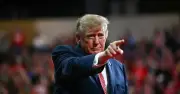 Trump Heckled Five Times at Kansas Rally, Claims Protesters Paid