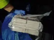 Two men arrested after £160k found in cars on M602