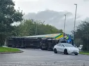 Warrington road closed after lorry overturns on roundabout
