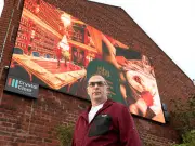 Woman compares living near illuminated sign to 'torture'