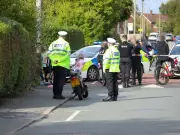 Woman hospitalised after Little Hulton car and motorbike crash