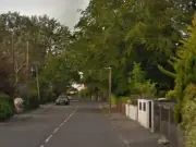 Woman injured after car crashes into garden wall in Swansea