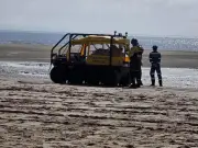 Woman rescued after getting stuck knee-deep in mud at Crosby Beach